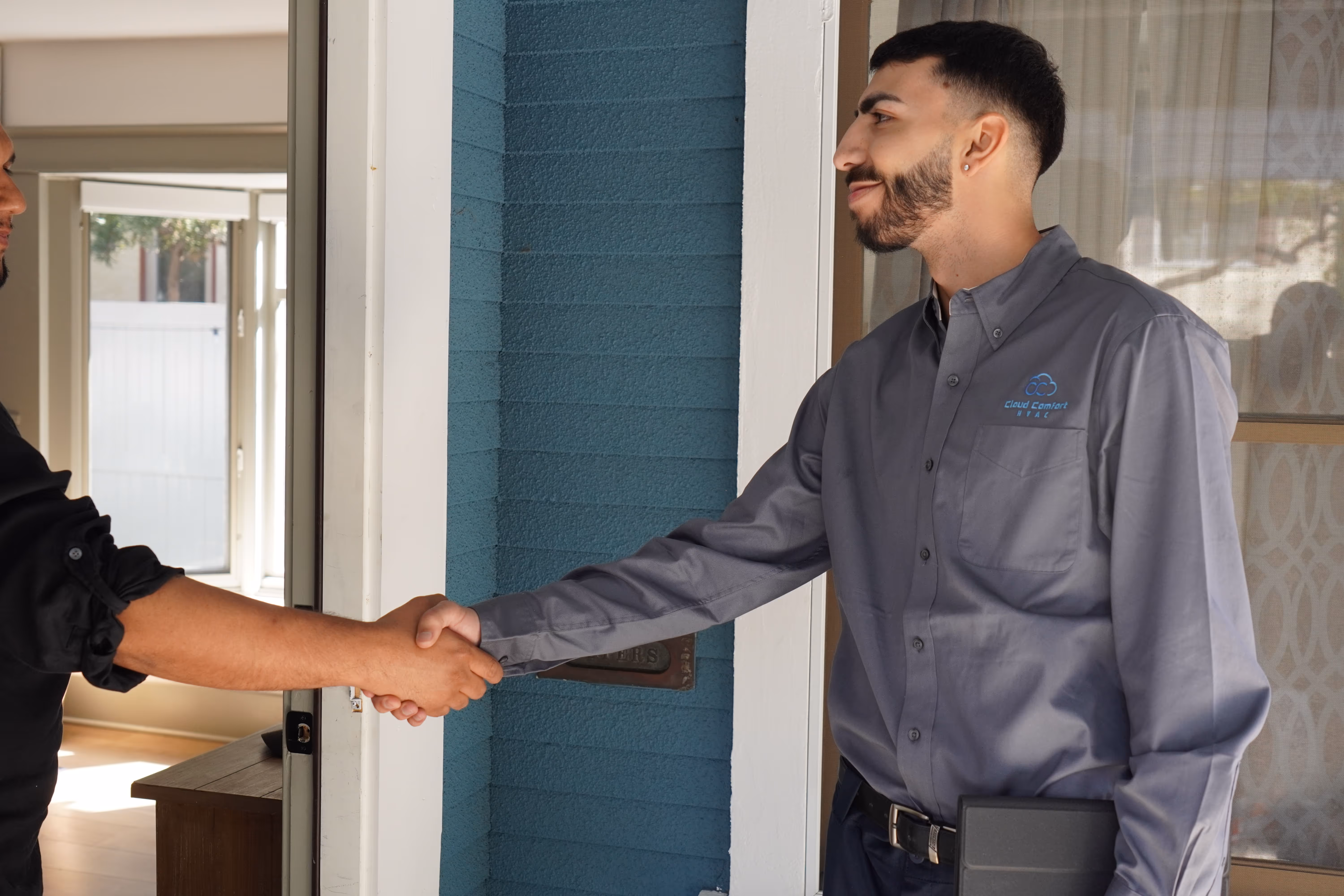 Cloud Comfort HVAC technicians on-site during a comfort visit